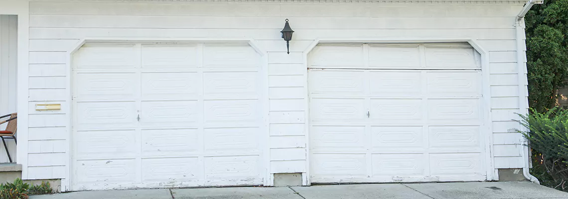 Roller Garage Door Dropped Down Replacement in Pensacola