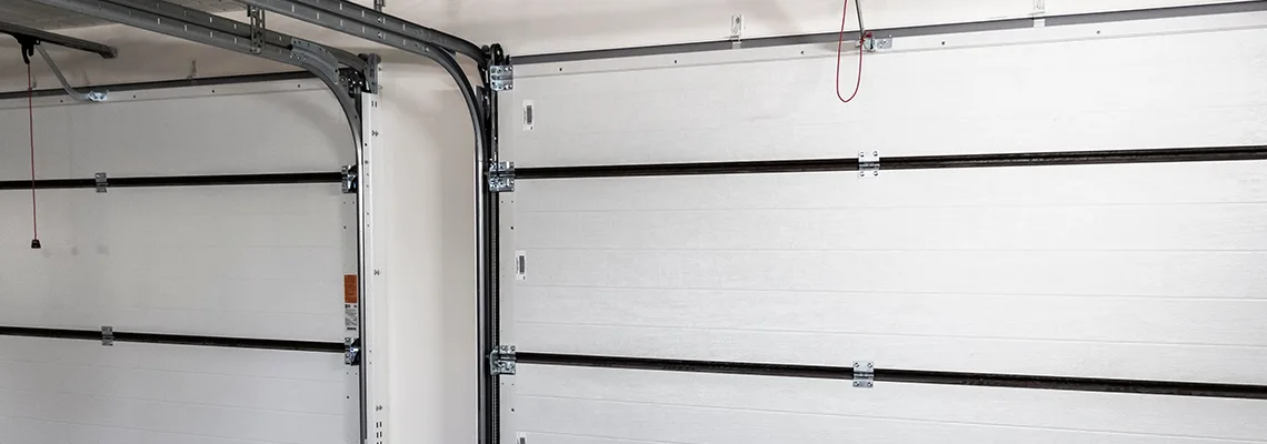 Fix Folding Garage Door Jerking in Pensacola