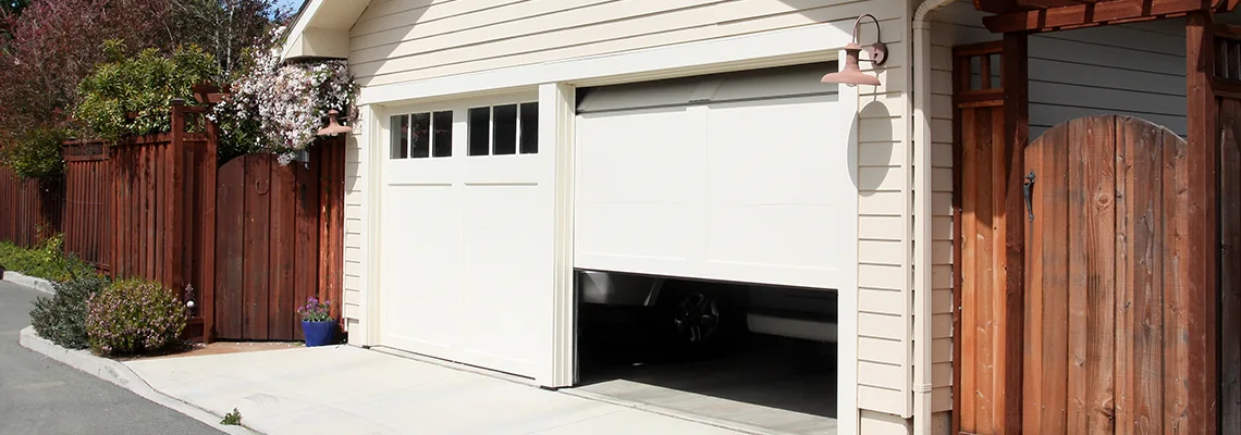 Fix Metal Garage Door Jerking in Pensacola